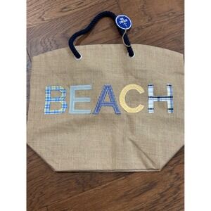 Jute beach tote bag featuring patchwork "BEACH" lettering